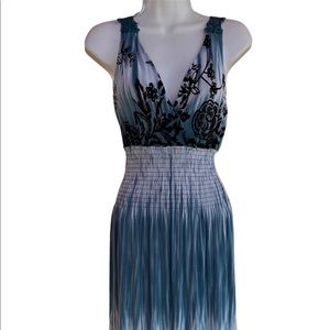 Pretty turquoise dress women with black floral design size M.